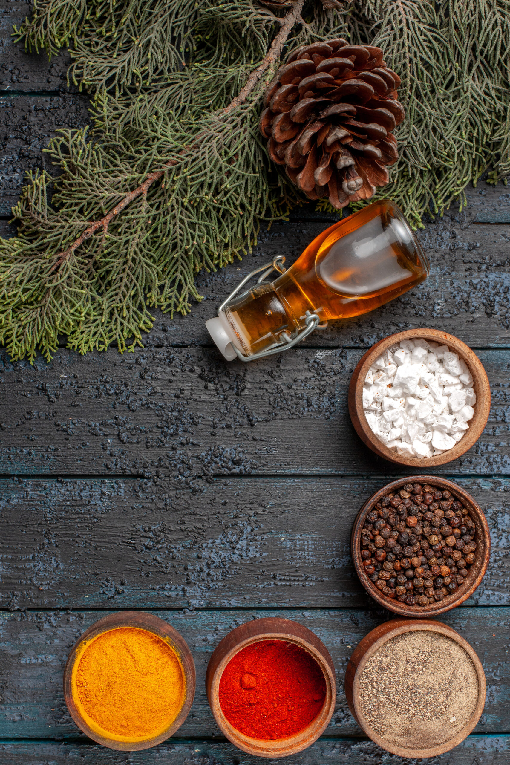 Cooking with herbs and spices on a wooden board